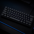 ION STRIKE MK1 keyboard black variant with blue backlight on dark desk